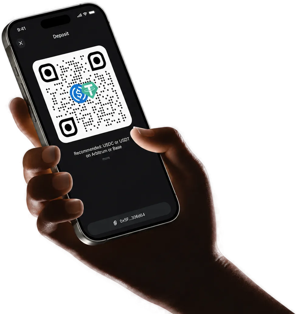 A hand holds a phone showing the Yodl Deposit screen with a receive QR code and wallet address.