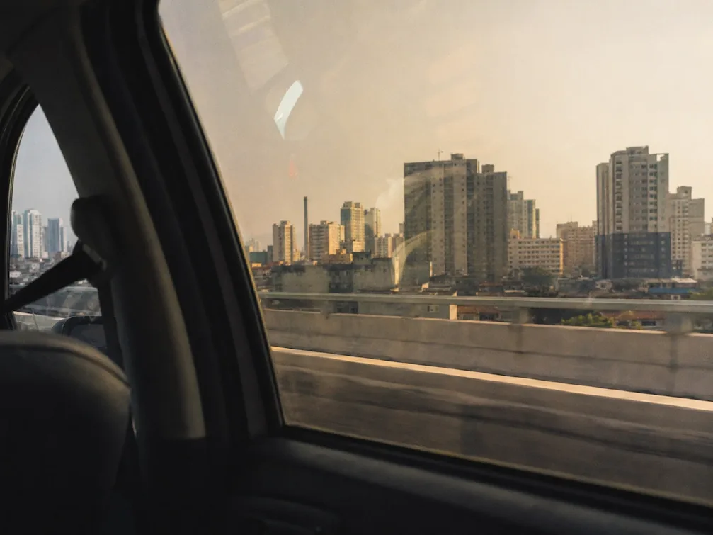 The view from a car window of the Sao Paulo skyline on the expressway in from the airport