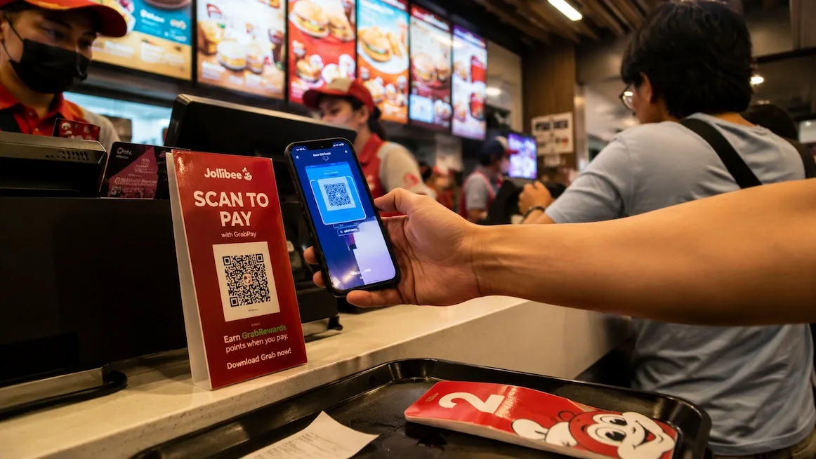 Scanning to pay at a Jollibee counter